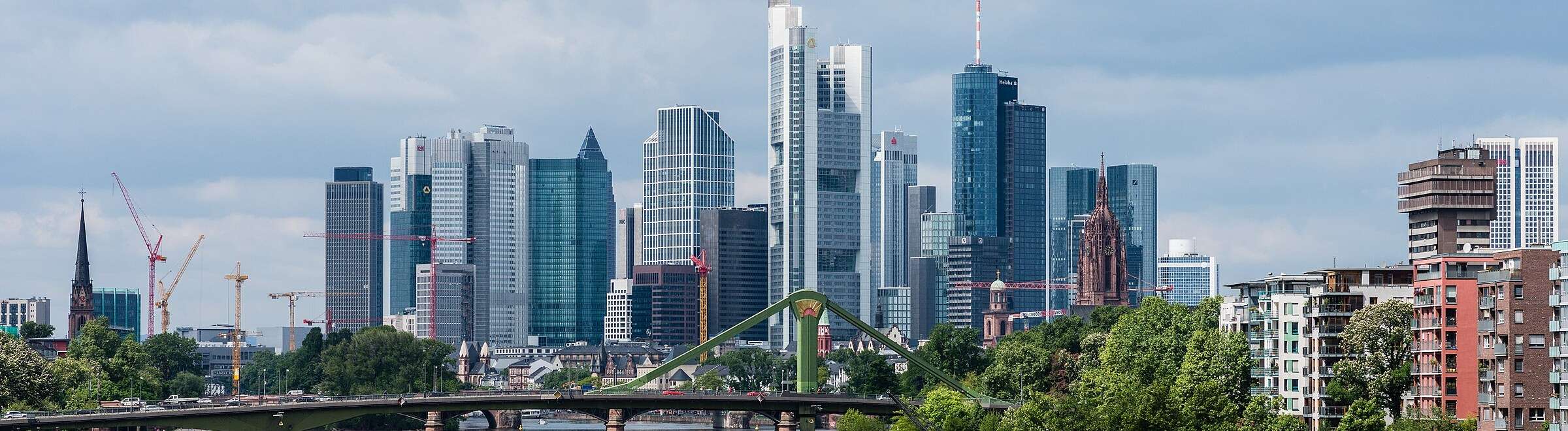 The Frankfurt skyline over the Main, with the cathedral tower among the bank towers